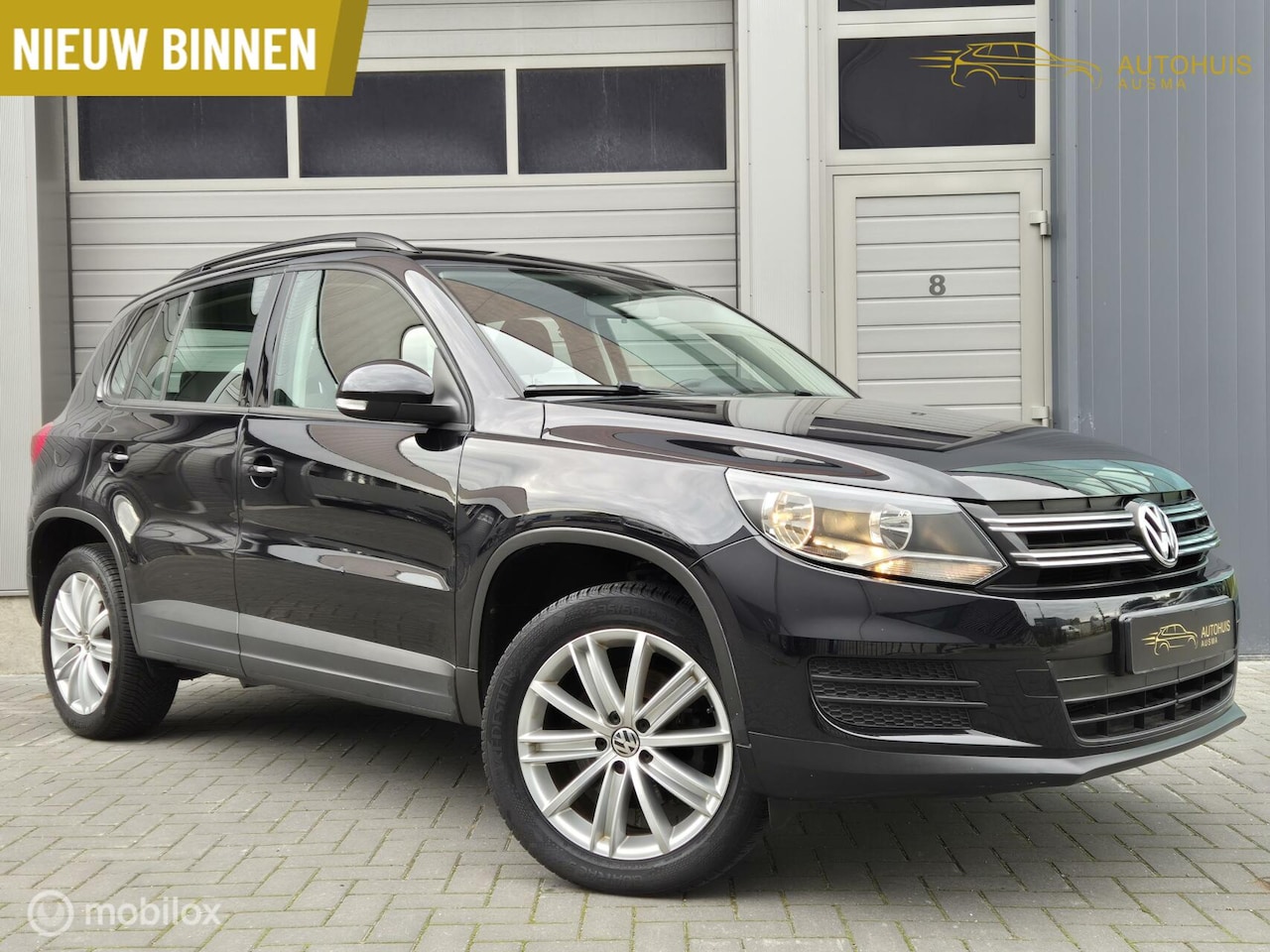 Volkswagen Tiguan - 1.4 TSI Trend & Fun Cruise/Navi/Sport/Trekhaak - AutoWereld.nl