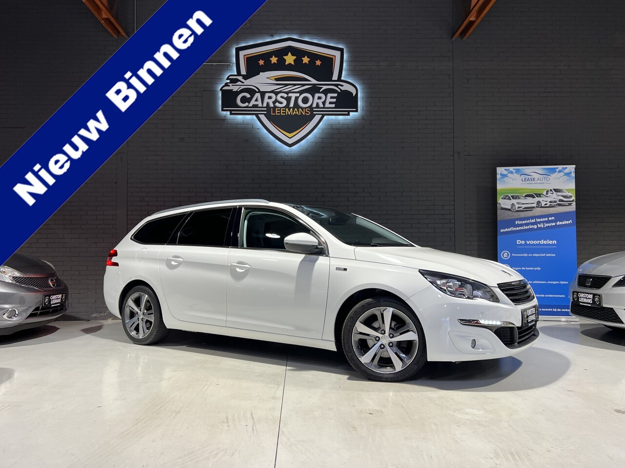 Peugeot 308 SW - 1.2 PureTech Style ClimaC.CruiseC.Pano.Camara.LMV!! - AutoWereld.nl