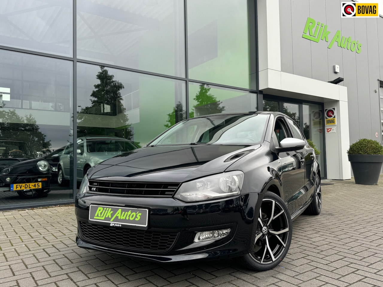 Volkswagen Polo - 1.4-16V R-Line * Carplay * PDC * Airco - AutoWereld.nl