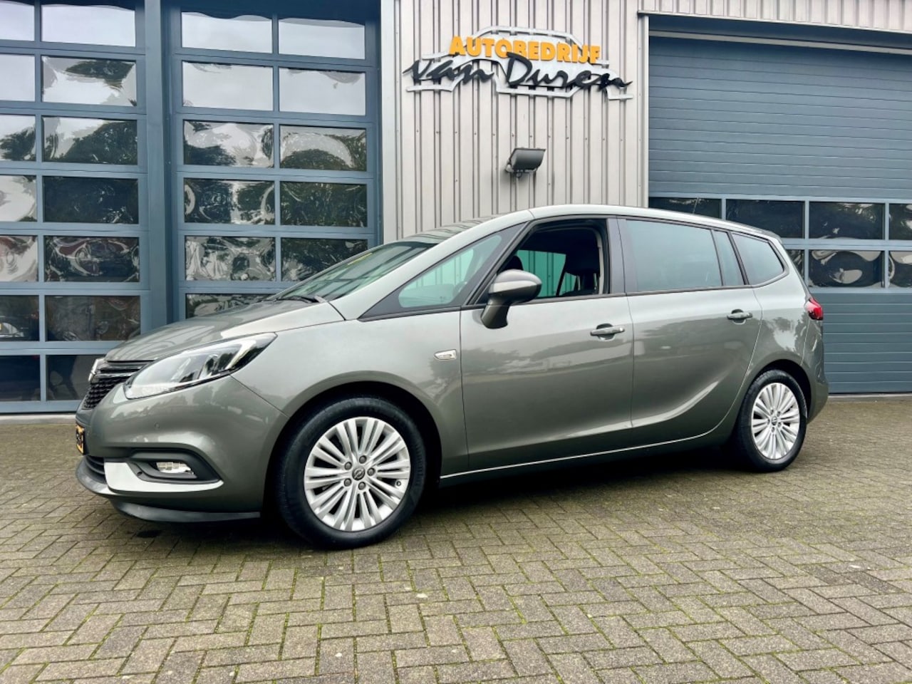 Opel Zafira Tourer - 1.4 T 140pk 7 pers. Online Edition  Clima/Cruise  AUR-Camera PDC - AutoWereld.nl