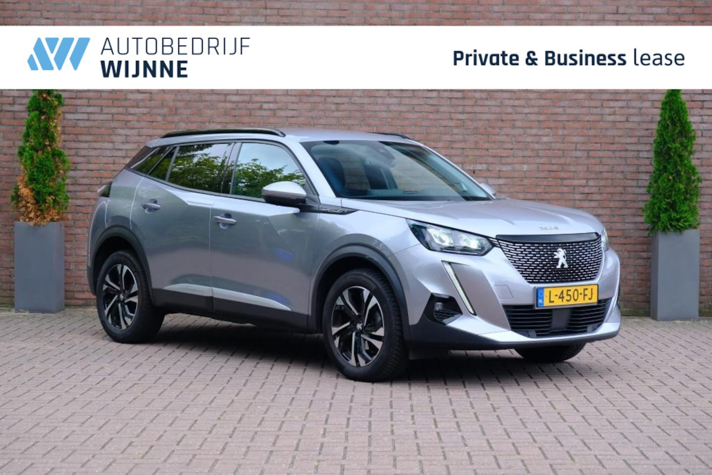 Peugeot 2008 - 1.2 PureTech Allure Pack | Navi | App Connect | Climate | Cruise | Camera | PDC | Trekhaak - AutoWereld.nl