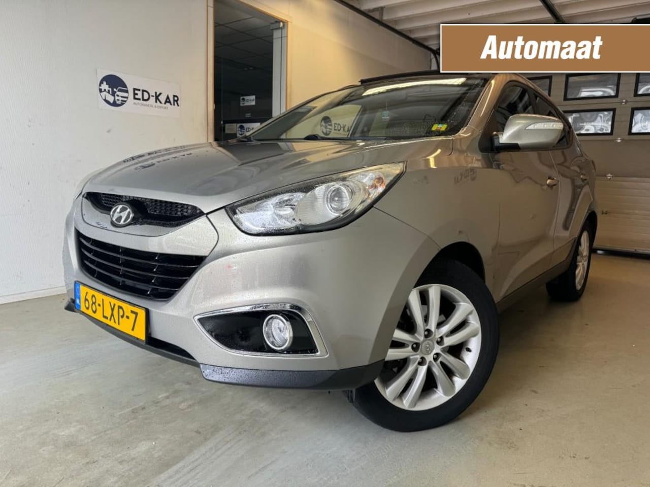 Hyundai ix35 - 2.0i i-Catcher AUT LEER PANO CLIMA TREKHAAK NAP APK - AutoWereld.nl