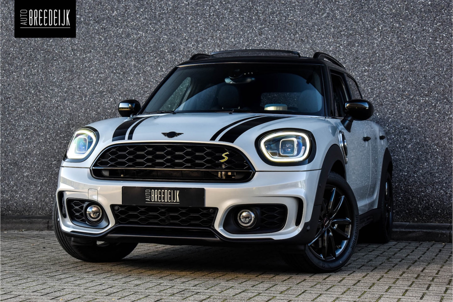 MINI Countryman - Cooper SE Hybrid ALL4 Aut. | JCW-Pakket | Navi | Panorama | Half Leder | Head-Up | Camera - AutoWereld.nl