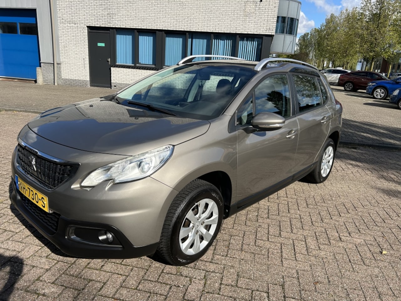 Peugeot 2008 - 1.2 PureT. Blue Lion 1eEIG/DEALER/PANO/NAVI/NAP! - AutoWereld.nl