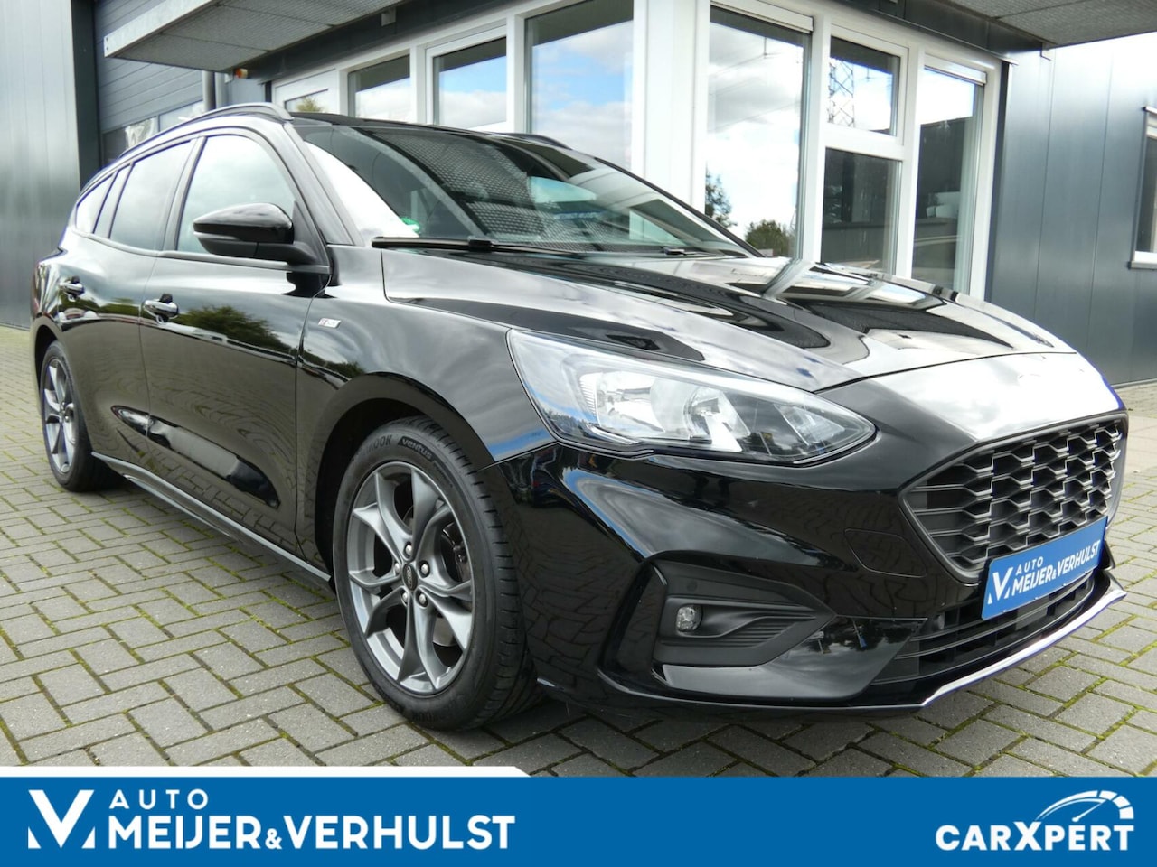 Ford Focus Wagon - 1.0 EcoBoost ST Line Business | AUTOMAAT | NAVI | CARPLAY | WINTER PAKKET | 98000 KM!!! - AutoWereld.nl