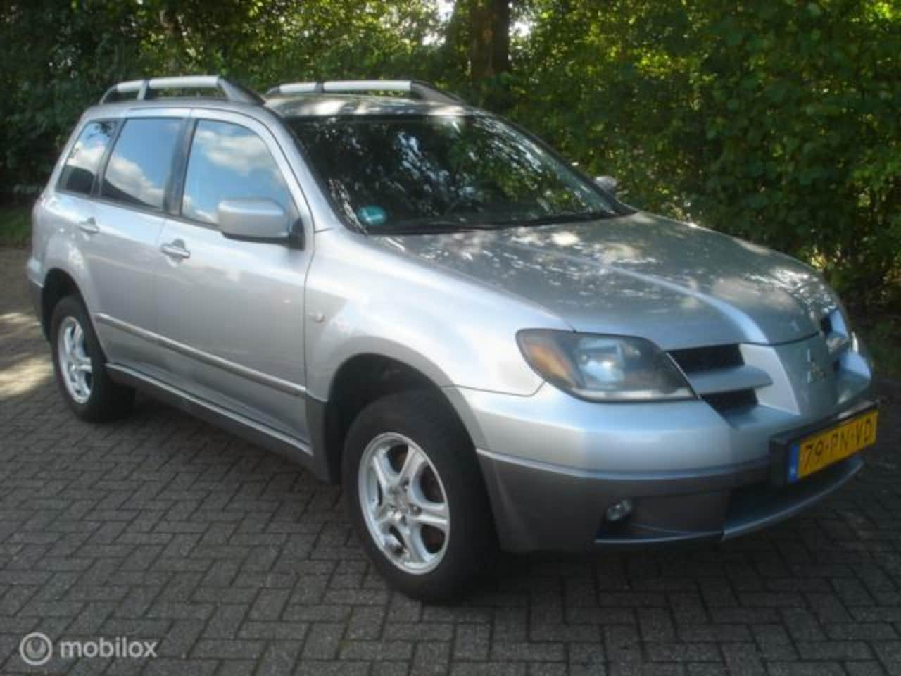 Mitsubishi Outlander - 2.4 I 4WD Airco Navi. Koppeling defect - AutoWereld.nl