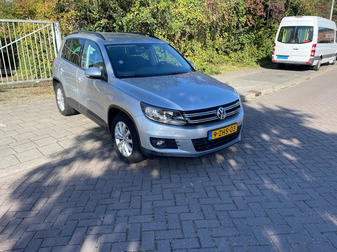 Volkswagen Tiguan - 1.4 TSI Comfort&Design Edition - AutoWereld.nl