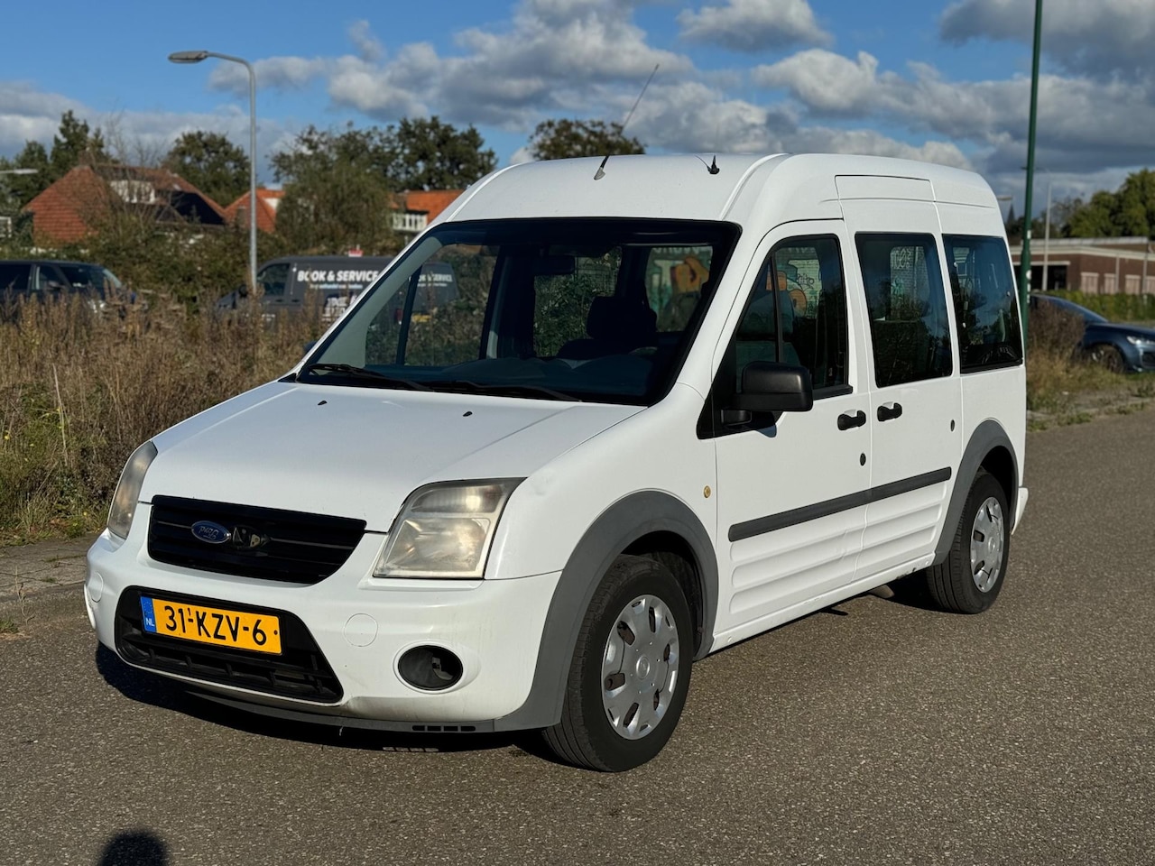 Ford Tourneo Connect - 1.8 TDCi LWB Trend 5p rolstoel - AutoWereld.nl