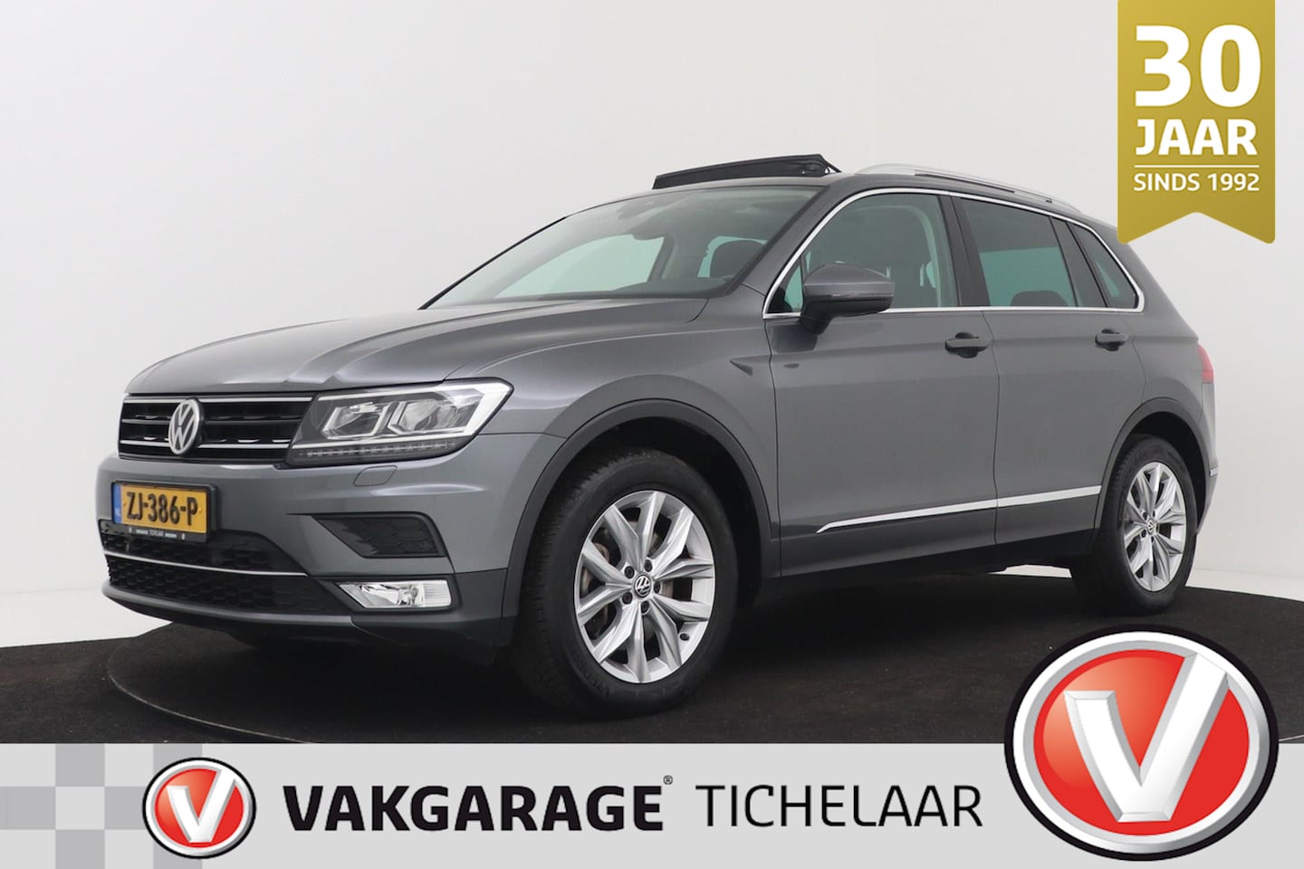 Volkswagen Tiguan - 2.0 TSI 4Motion Highline | Trekhaak | Panoramadak | CarPlay | Camera | Stoelverwarming | - AutoWereld.nl