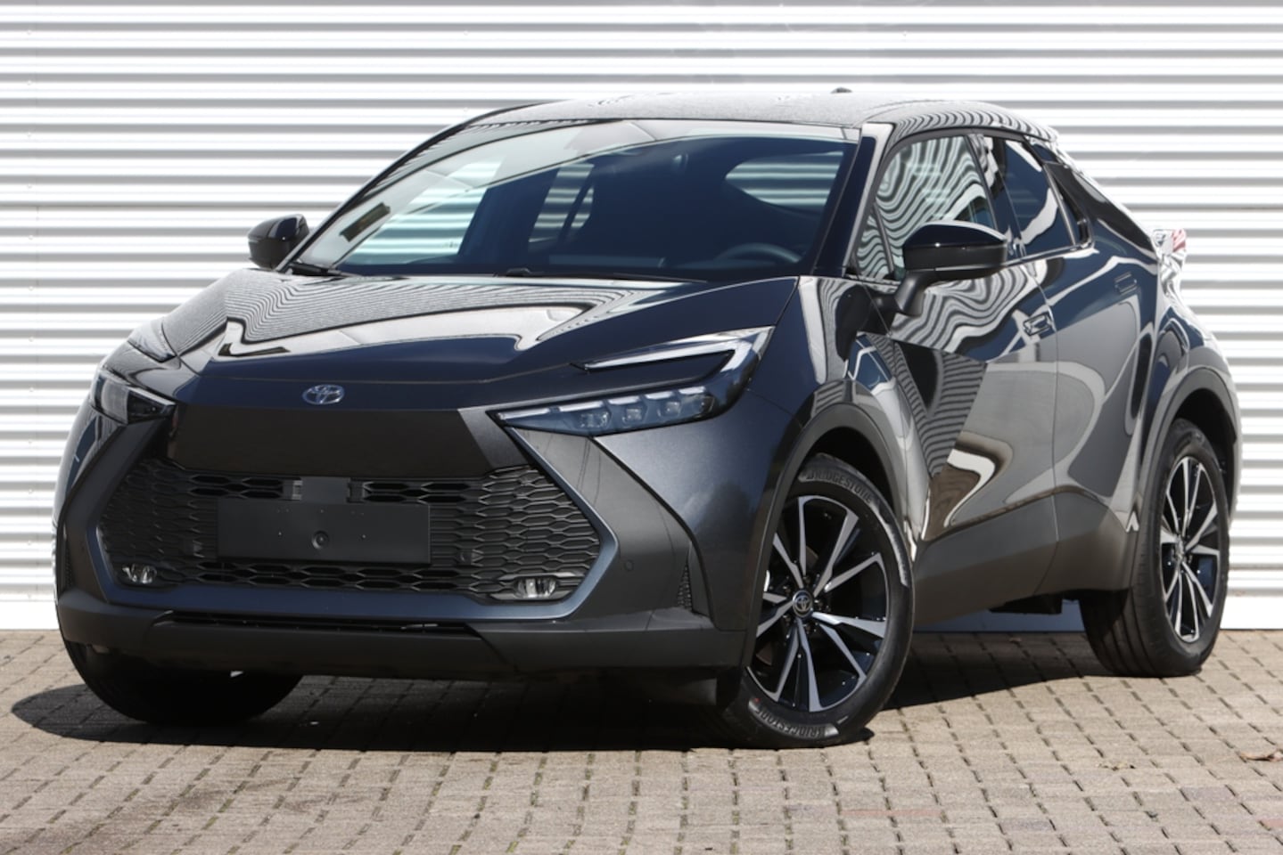 Toyota C-HR - 1.8 Hybrid 140 First Ed. Bi-Tone NIEUW - AutoWereld.nl