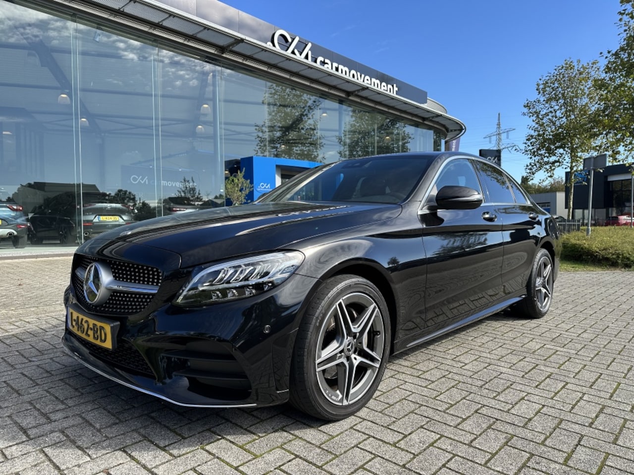 Mercedes-Benz C-klasse - 200 AMG Line 184PK | Navi | Elek. Trekhaak | LED | Dodehoek - AutoWereld.nl