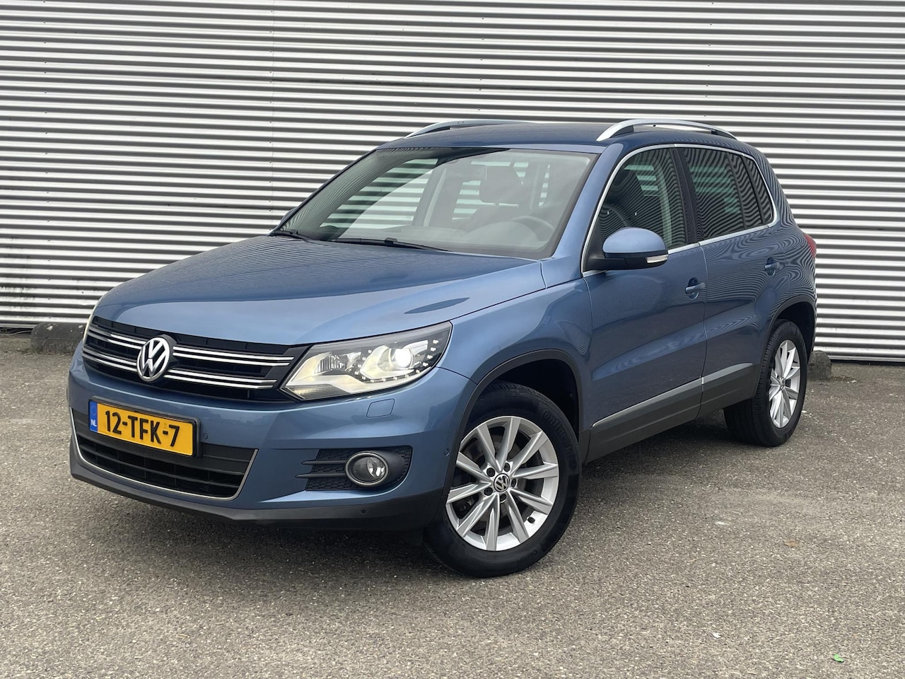 Volkswagen Tiguan - 1.4 TSI Sport&Style - AutoWereld.nl