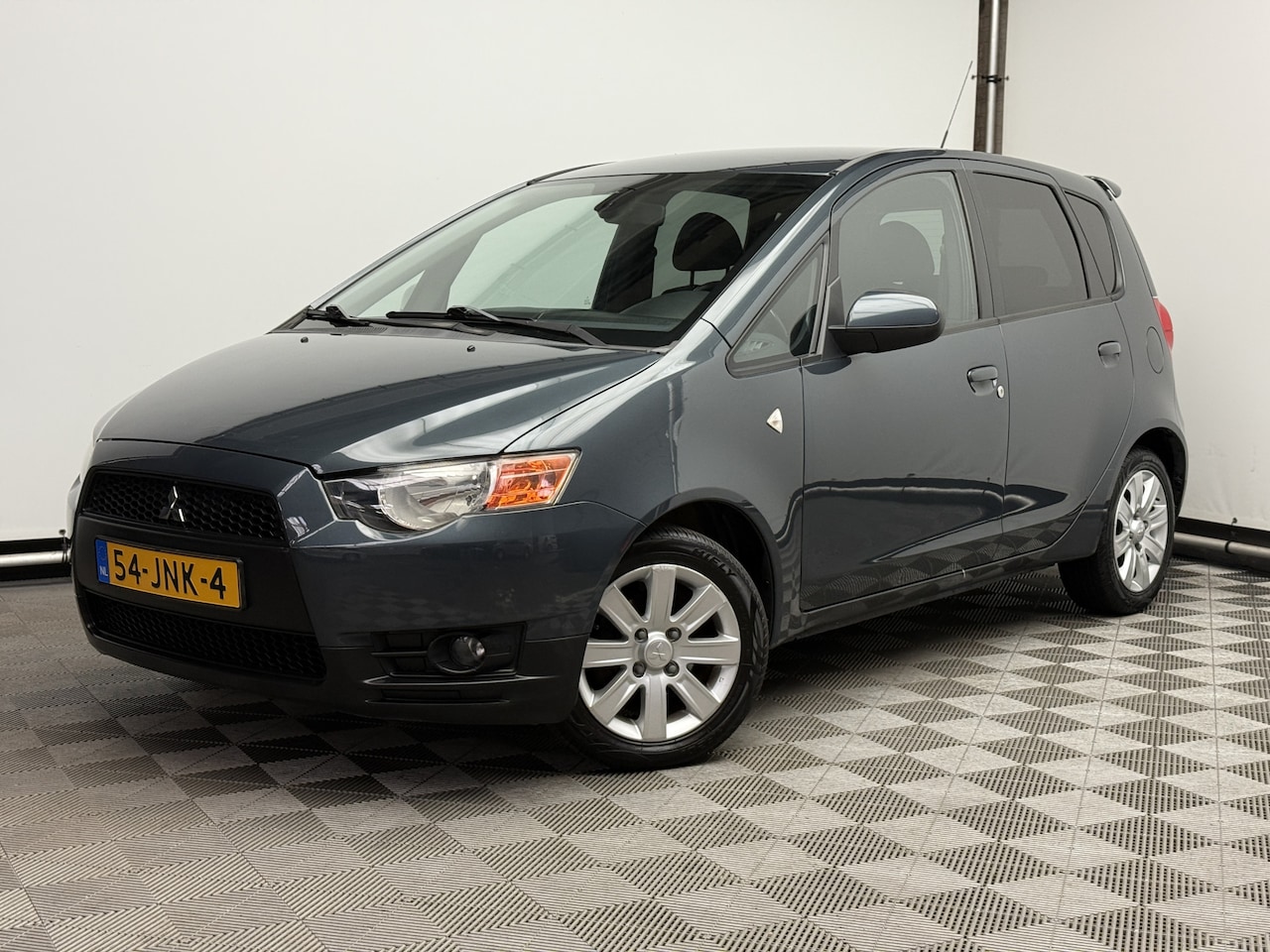 Mitsubishi Colt - 1.3 Intro Edition 5-drs Airco Cruise LM15" NL Auto - AutoWereld.nl