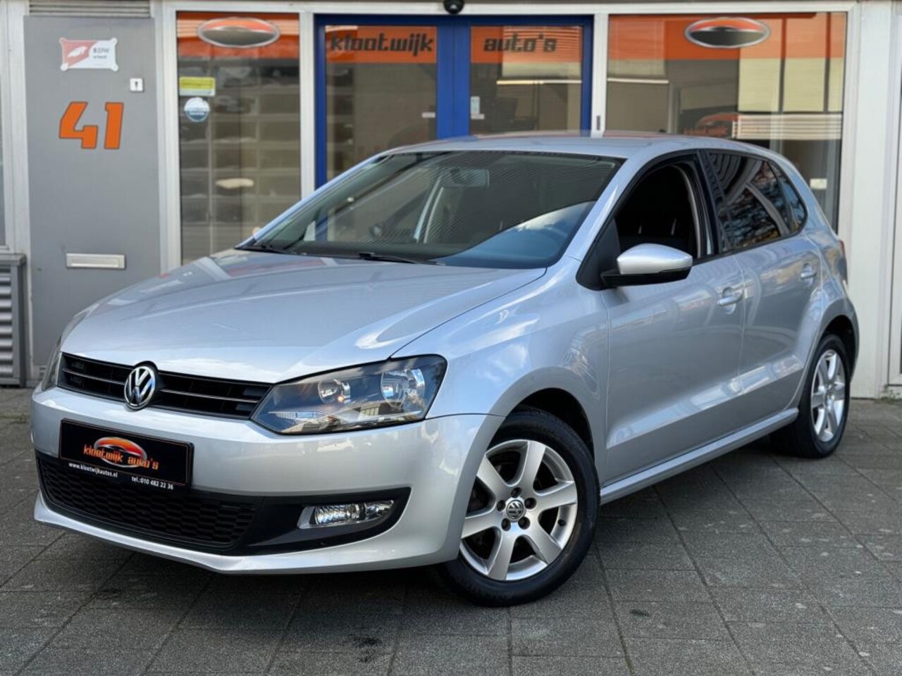 Volkswagen Polo - 1.2 Comfortline Navigatie Airco 5-Deurs LM PDC - AutoWereld.nl