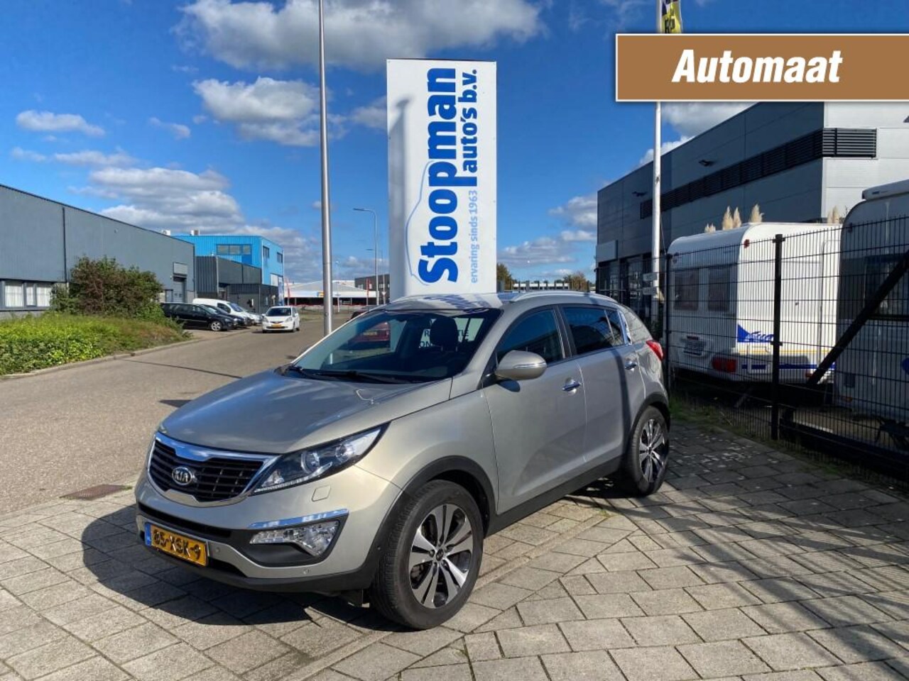 Kia Sportage - 2.0 Super Pack Aut. Leder+Stv. Clima Cruise 102.616km - AutoWereld.nl