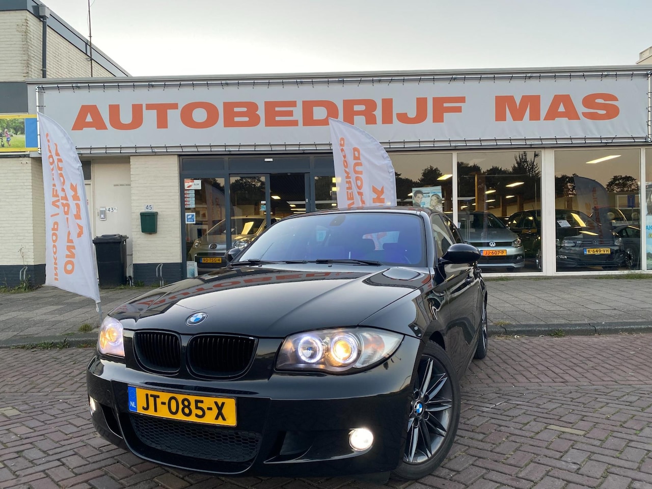 BMW 1-serie - 116i M-Pakket Xenon Airco Trekhaak Stoelvw Cruise Control - AutoWereld.nl