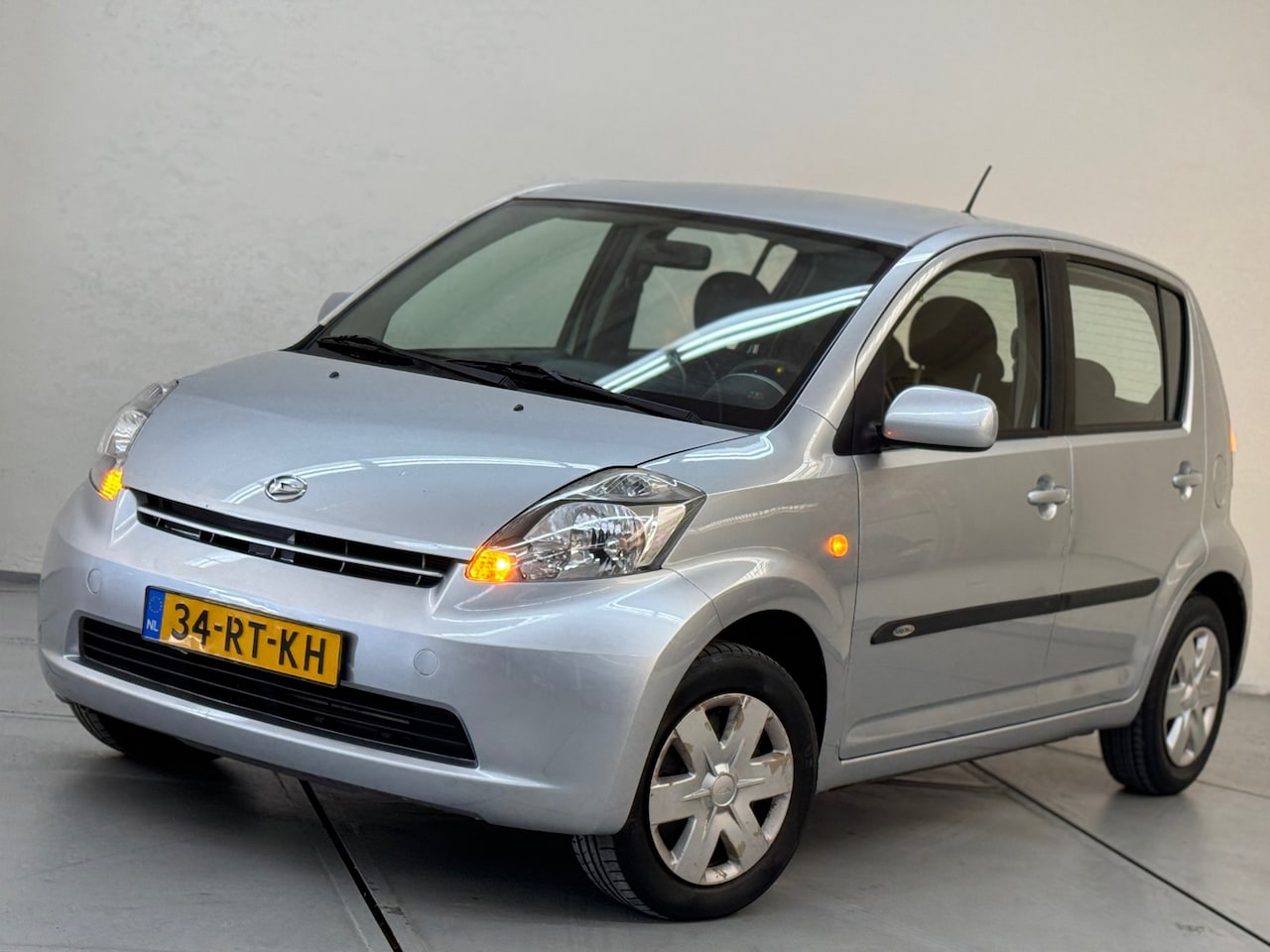 Daihatsu Sirion 2 - 1.3-16V Prestige AUTOMAAT 61.000 KM Airco - AutoWereld.nl