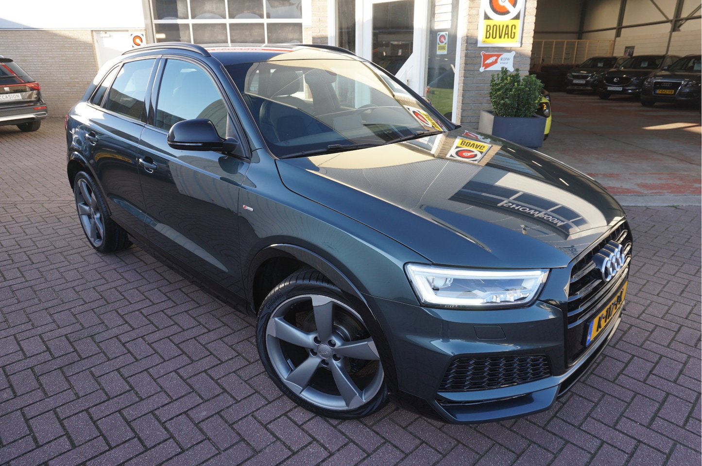 Audi Q3 - 2.0 TFSI Quattro Design Pro Line S Plus Automaat - AutoWereld.nl