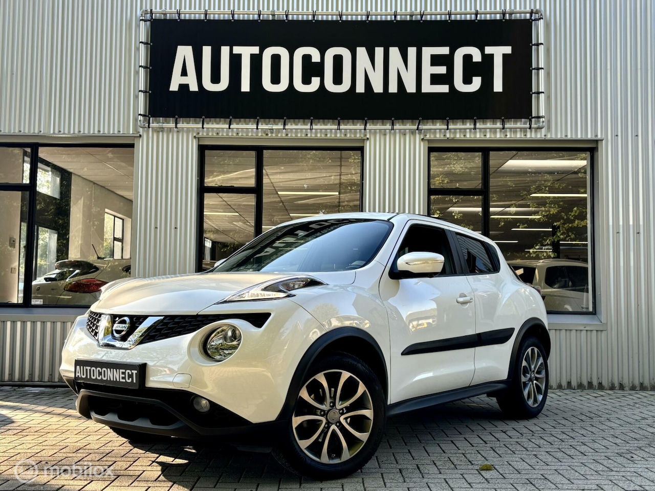 Nissan Juke - 1.6 Tekna. PANODAK, NAVI, AUTOMAAT, CRUISE. - AutoWereld.nl