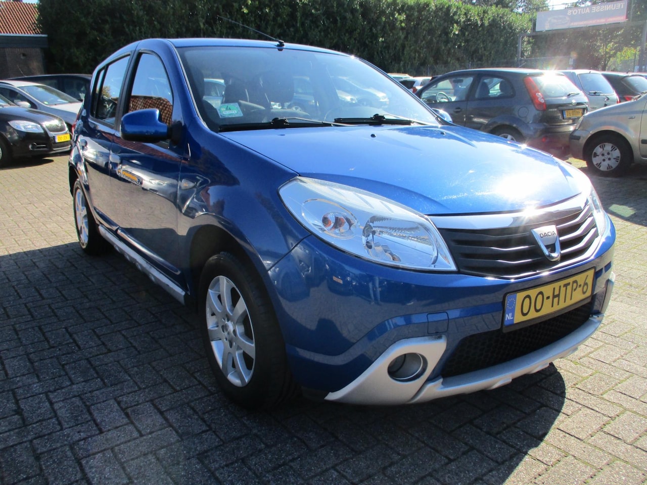 Dacia Sandero - 1.4 Lauréate 76DKM! AIRCO! APK 3-2025! - AutoWereld.nl