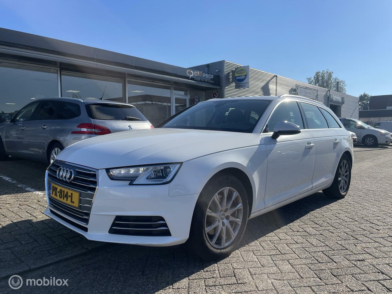 Audi A4 Avant - 2.0 TFSI Sport Automaat - AutoWereld.nl