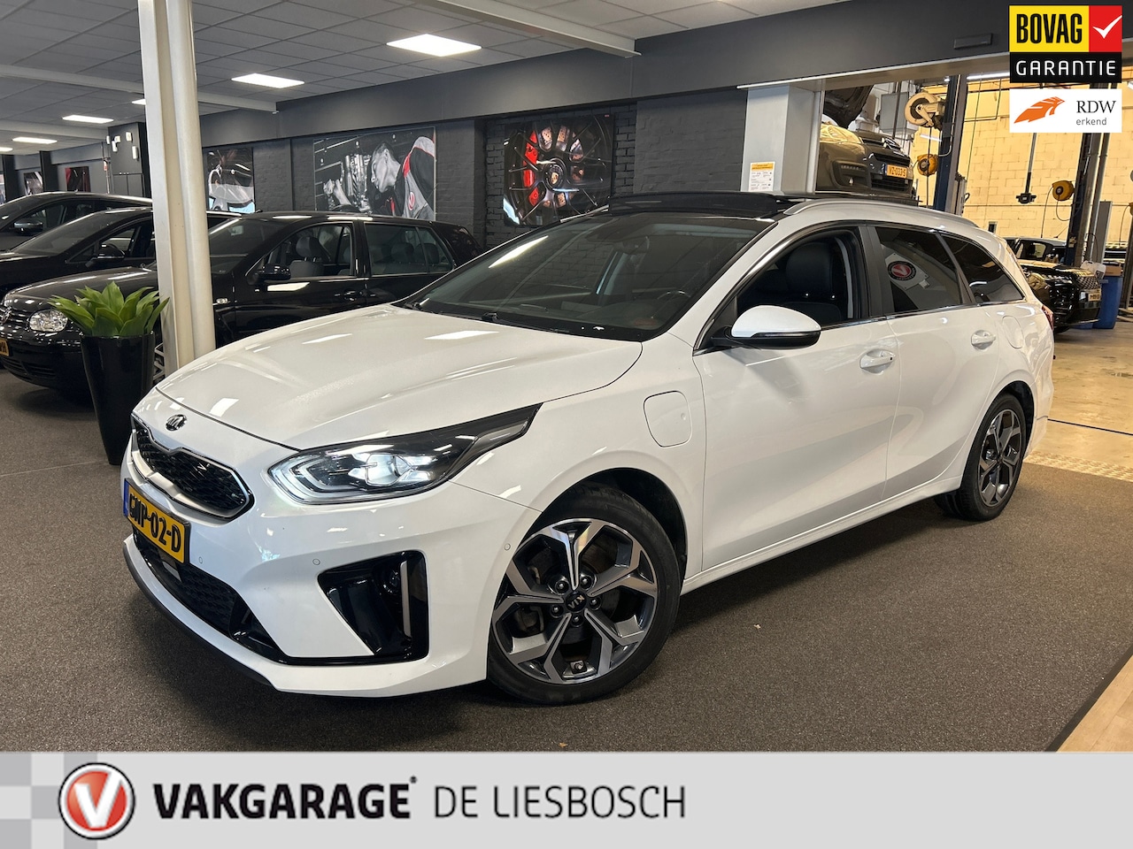 Kia Cee'd Sportswagon - Ceed 1.6 GDI PHEV ExecutiveLine / leder /camera / stoel en stuur verwarming - AutoWereld.nl