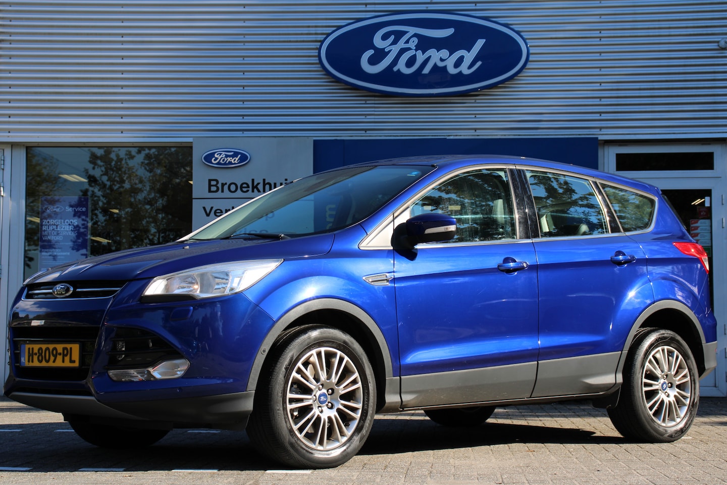 Ford Kuga - 1.6 Titanium Plus 4WD AUTOMAAT | DEALER OH! | WINTERPACK | LEDER | CRUISE | PARK SENS V+A - AutoWereld.nl