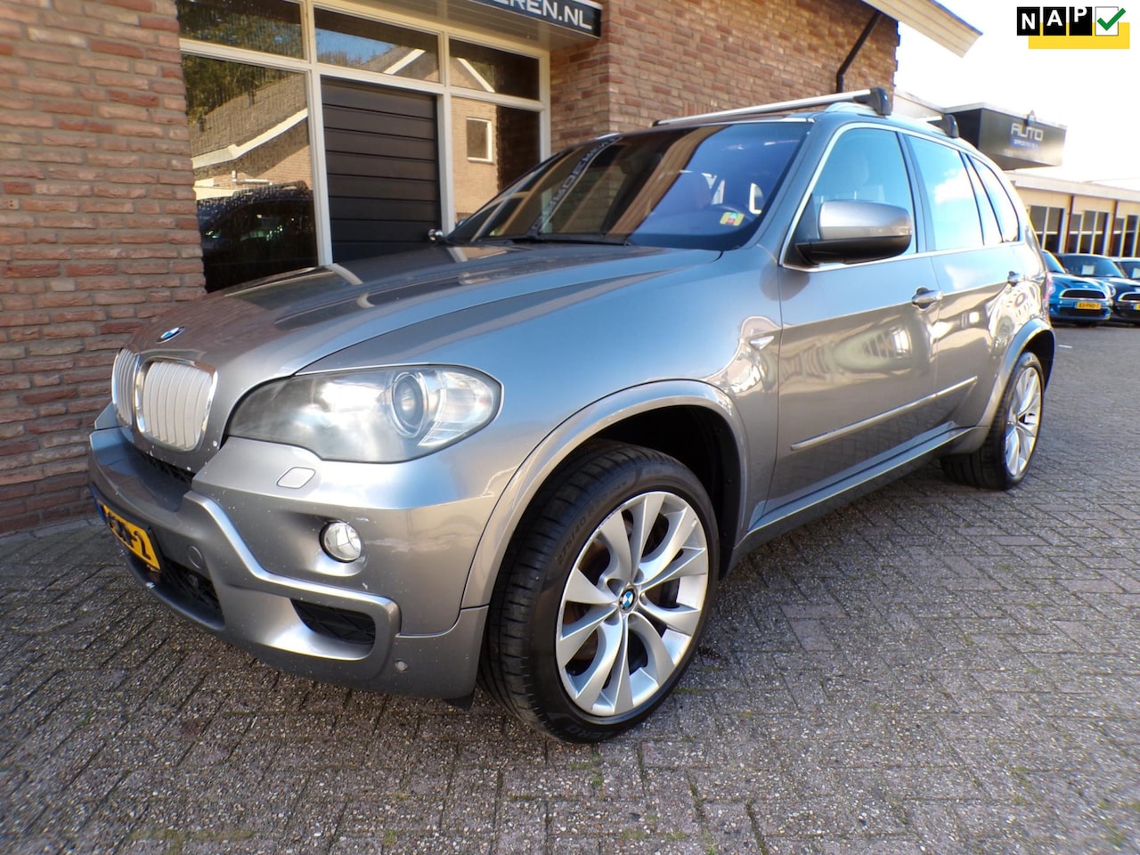 BMW X5 - 3.0sd High Executive Automaat / Leder / Panoramadak / 7 Persoons - AutoWereld.nl