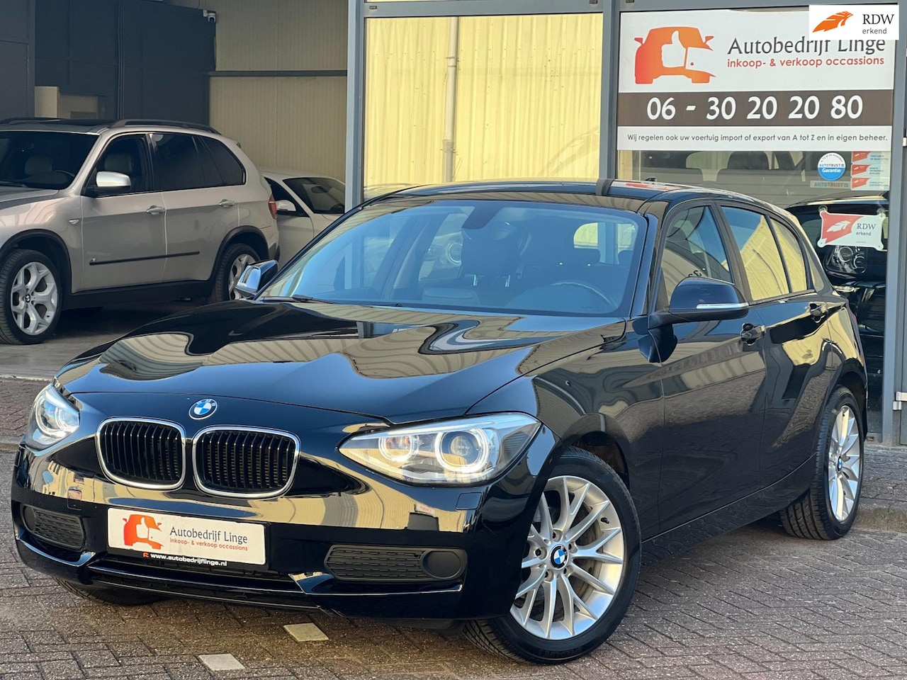 BMW 1-serie - 116i High Executive | Climate | Cruise | Navi | Bi-xenon - AutoWereld.nl