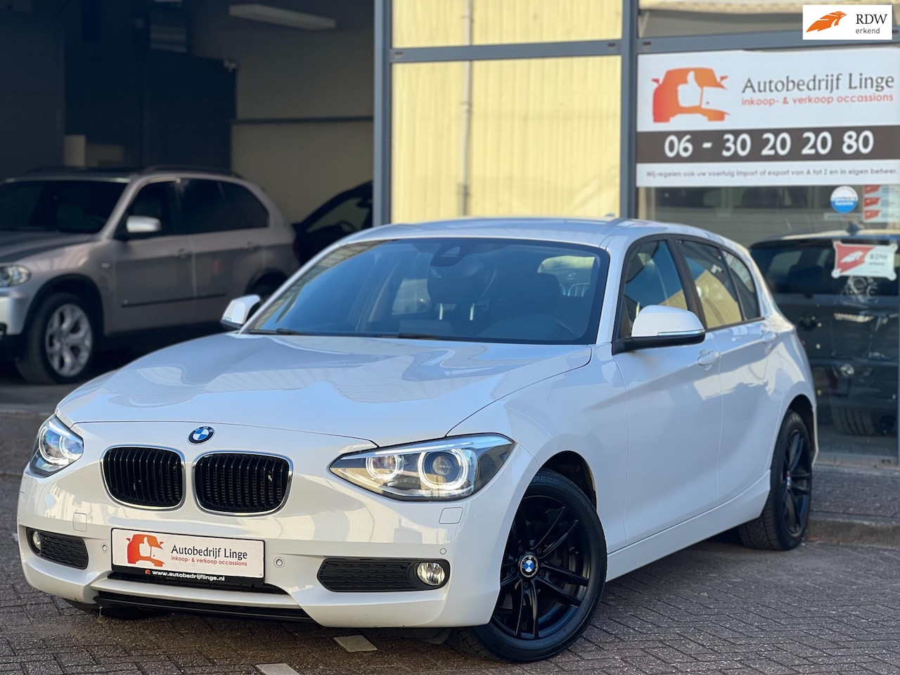 BMW 1-serie - 116i High Executive | Climate | Cruise | Navi | Dealer - AutoWereld.nl