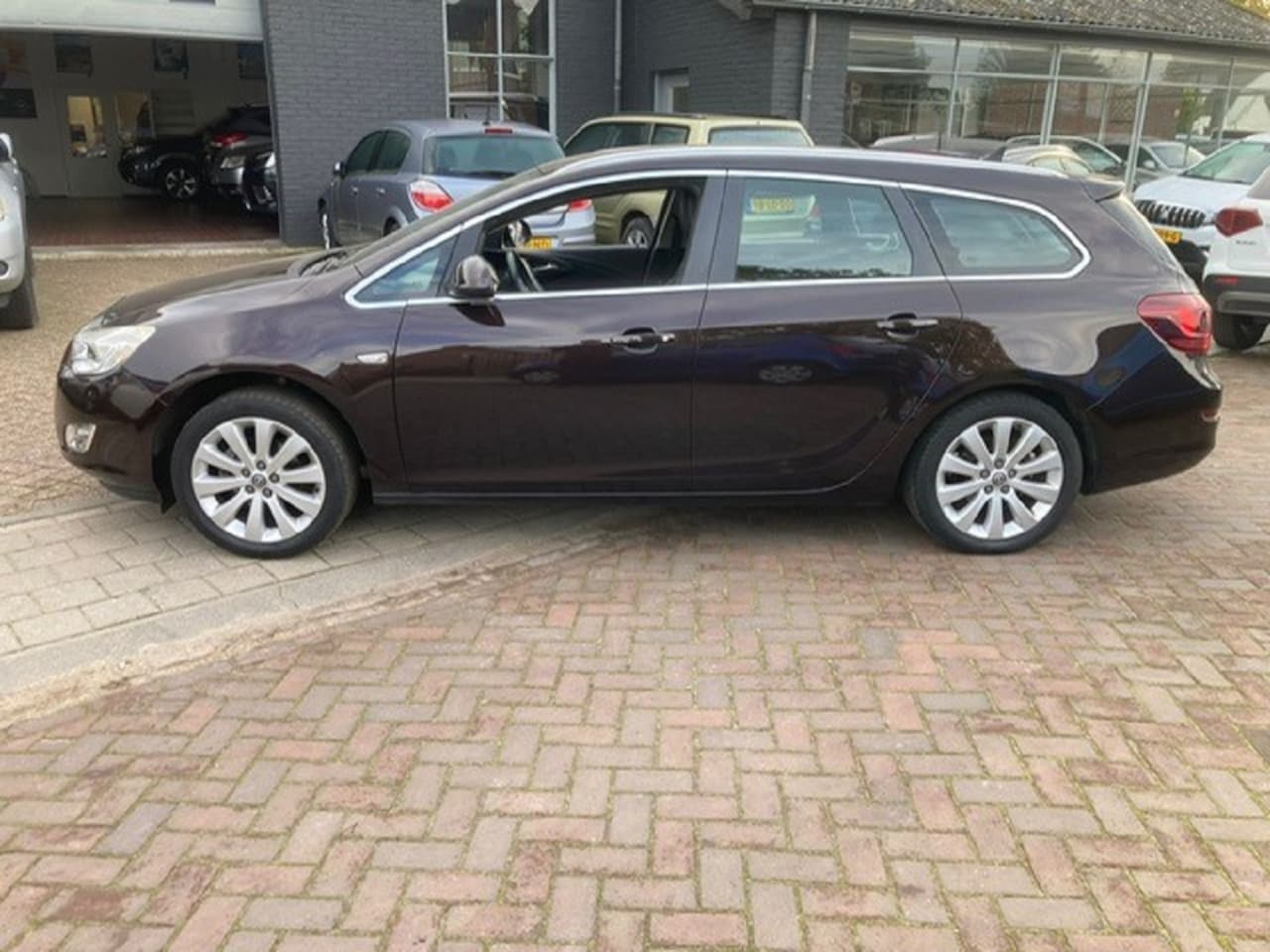 Opel Astra Sports Tourer - 1.4 Turbo Cosmo Opel Astra1.4i turbo 120pk sport tourer cosmo - AutoWereld.nl