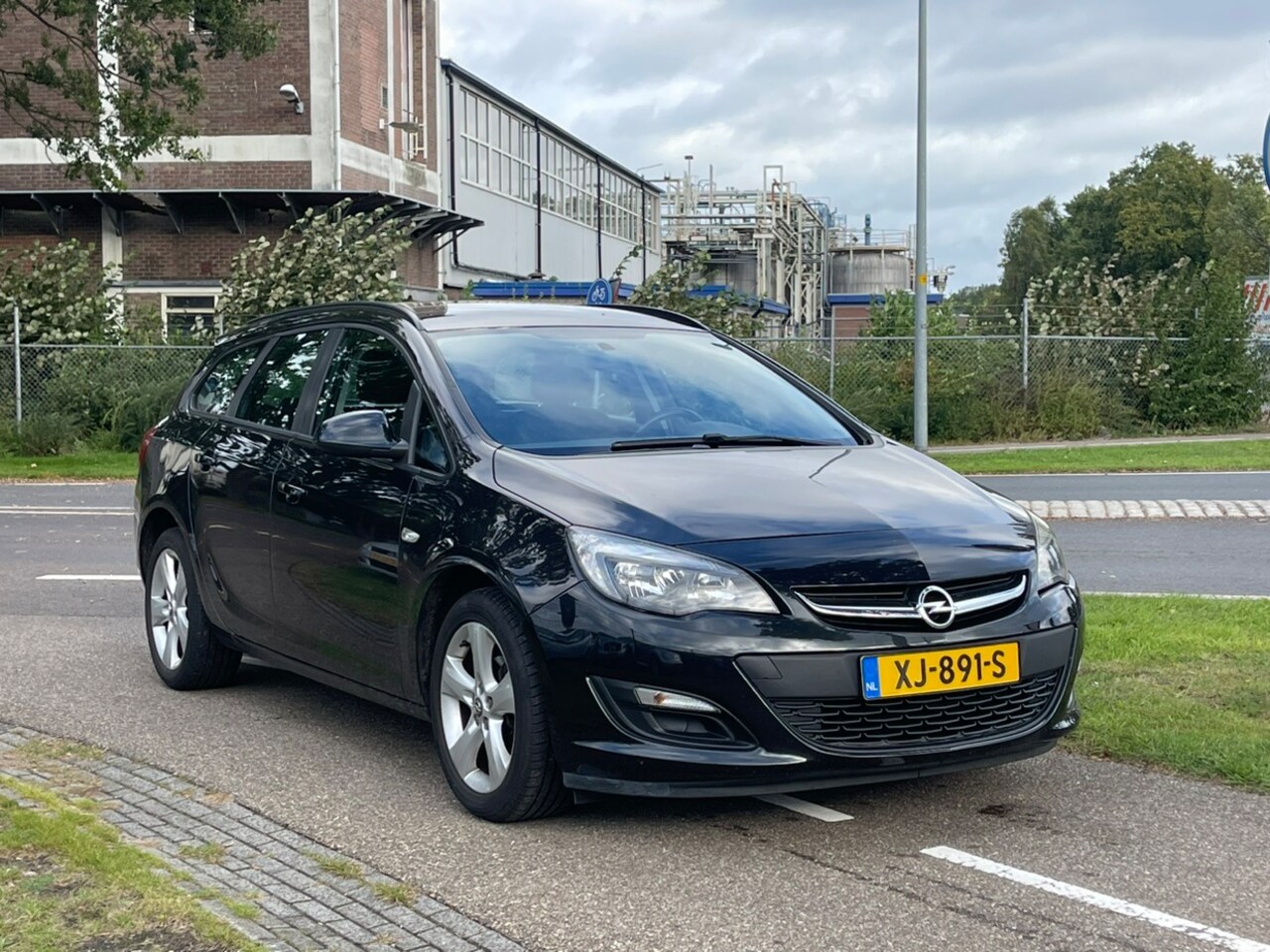 Opel Astra Sports Tourer - 1.4 Turbo Edition | AUTOMAAT | Cruise Control | Trekhaak - AutoWereld.nl