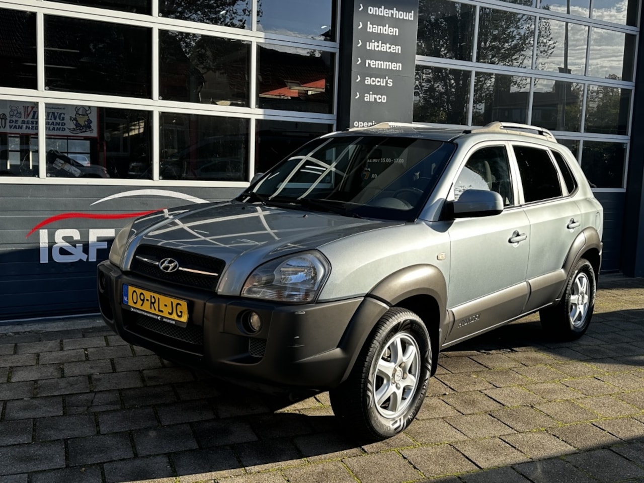 Hyundai Tucson - 2.0i Dynamic Airco Trekhaak - AutoWereld.nl