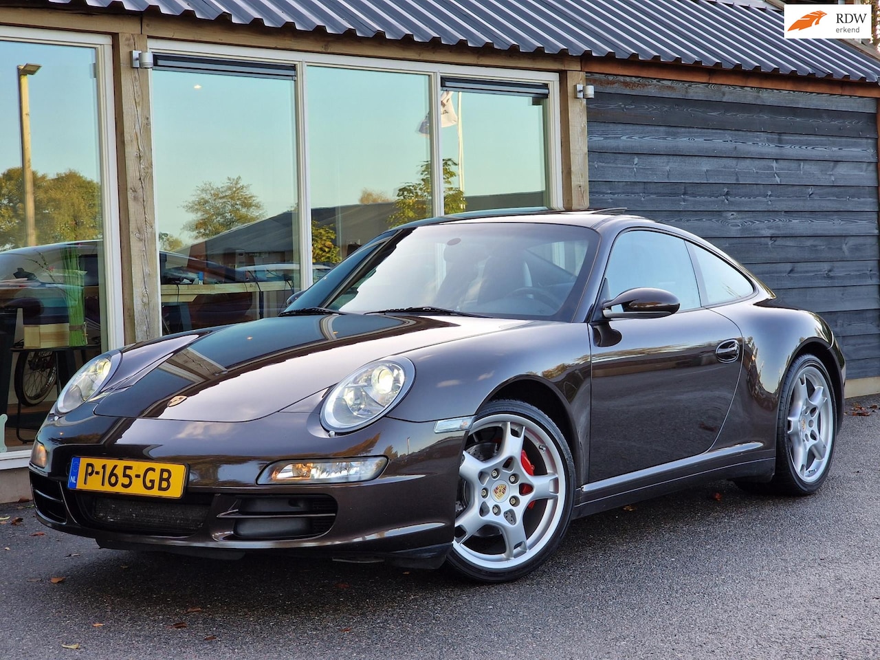 Porsche 911 - 3.8 Carrera S 3.8 Carrera S (Gereviseerde motor / Schuif/-kanteldak / 19 Inch / Alcantara hemel) - AutoWereld.nl