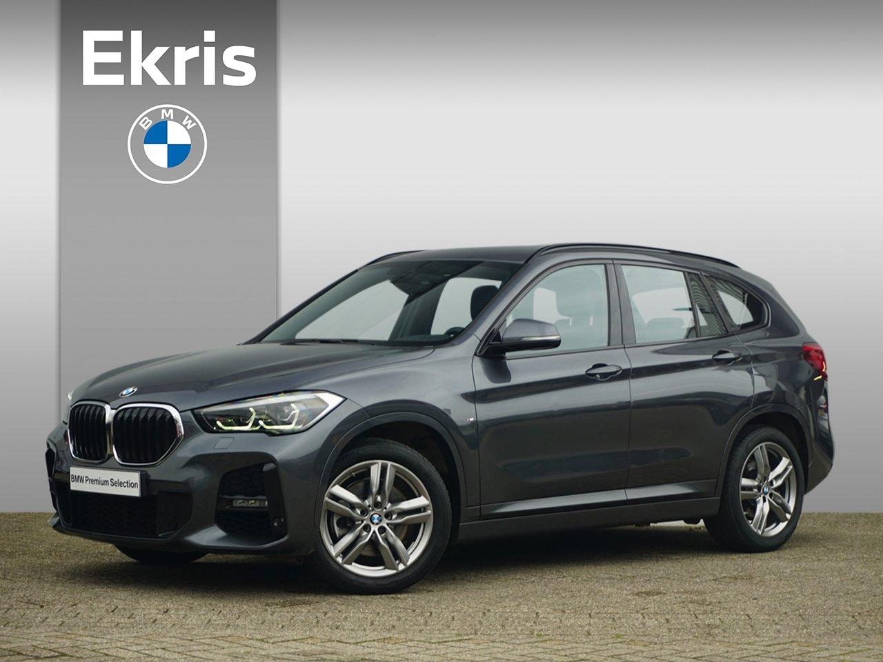 BMW X1 - xDrive20i M Sportpakket 18'' / Verwarmde stoelen / Trekhaak / Elektrische achterklep | Sho - AutoWereld.nl