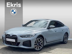 BMW i4 - eDrive35 High Executive M Sportpakket 18'' / Schuif/-kanteldak / M Sportremsysteem / Stuur