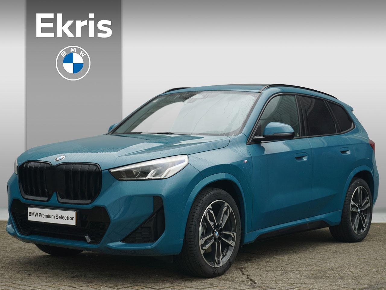 BMW X1 - 18i sDrive M Sport Panorama Dak / Trekhaak | Showroom Sale - AutoWereld.nl