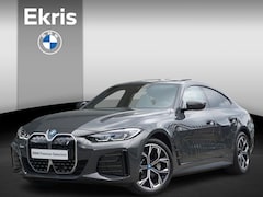 BMW i4 - eDrive40 84 kWh High Executive M Sport/ Hifi / Schuif- Kanteldak / Stuurwielverwarming