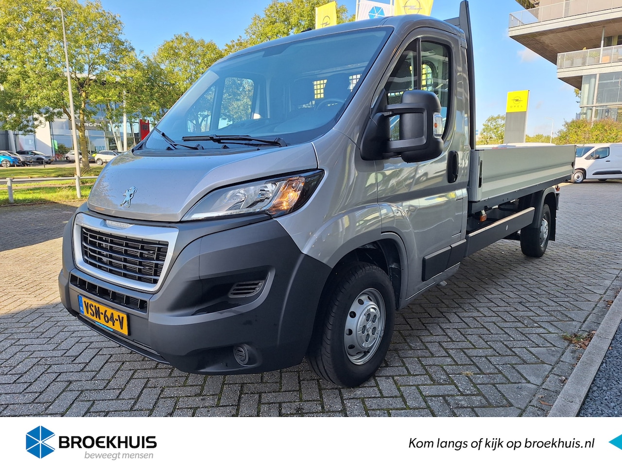 Peugeot Boxer - L4 335 2.2 BlueHDi 140 PK Open Laadbak Airco | Cruise Control | Navigatie - AutoWereld.nl