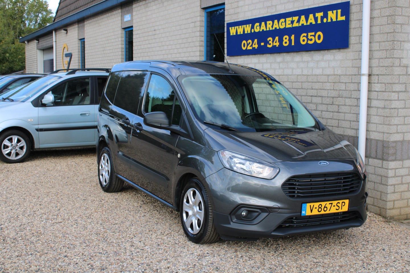 Ford Transit Courier - 1.0 Trend Airco Navi schuifdeur - AutoWereld.nl