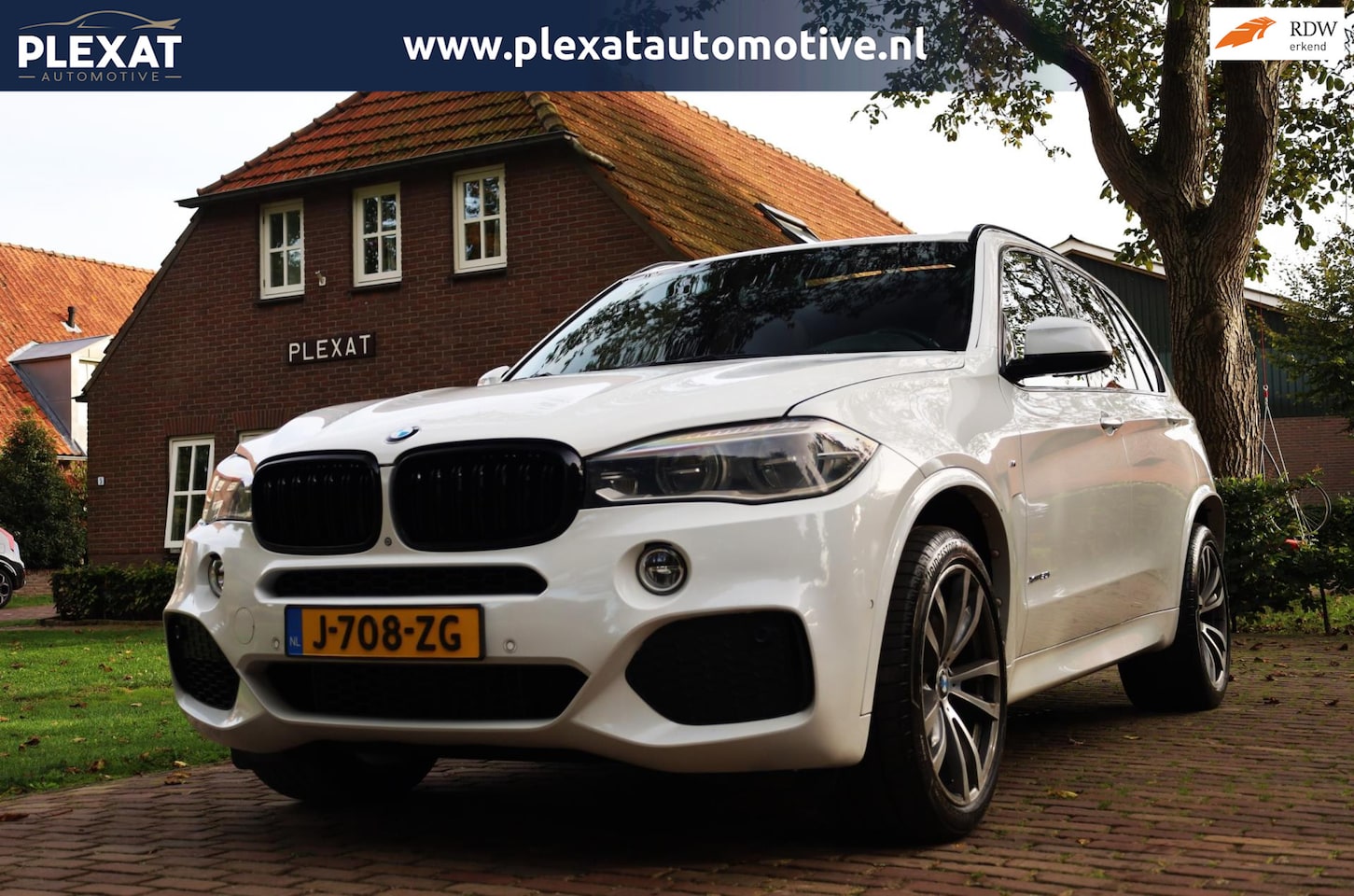 BMW X5 - XDrive50i High Executive 7p. Aut. | M-Pakket | Panorama | Lederen Dashboard | Harman-Kardo - AutoWereld.nl