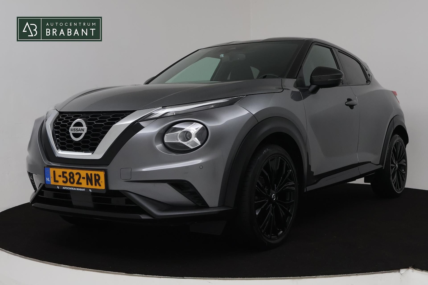 Nissan Juke - 1.0 DIG-T Enigma (CAMERA, CRUISE CONTROL, PARKEERSENSOREN, CLIMATE CONTROL, NL-AUTO, GOED - AutoWereld.nl