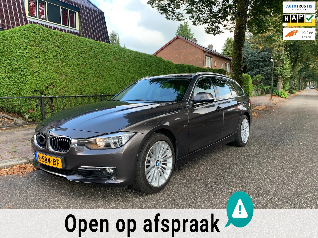 BMW 3-serie Touring - 328i xDrive 245PK Aut leder navigatie camera PDC cruise clima - AutoWereld.nl