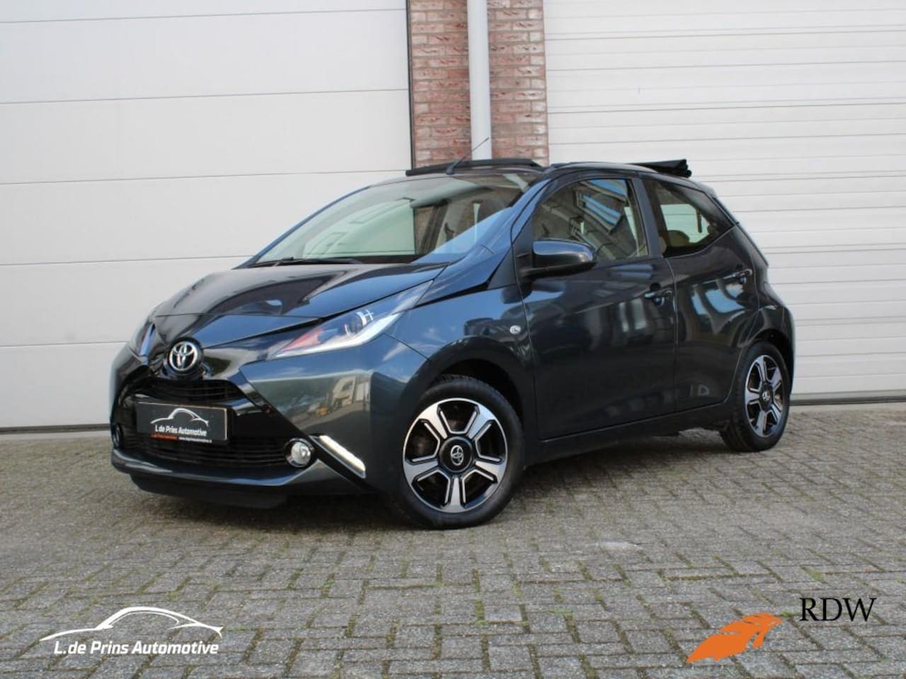 Toyota Aygo - 1.0 VVT-I X-POSE /Cabrio/Apple Carplay/Camera - AutoWereld.nl