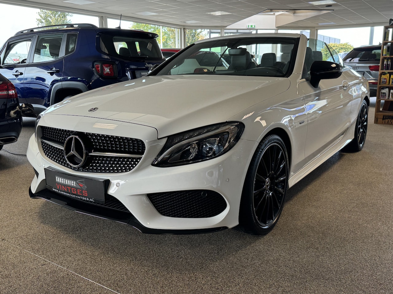 Mercedes-Benz C-klasse Cabrio - 180 AMG Line Premium Plus Camera, Airscarf , PDC, Navi, 19"inch! - AutoWereld.nl