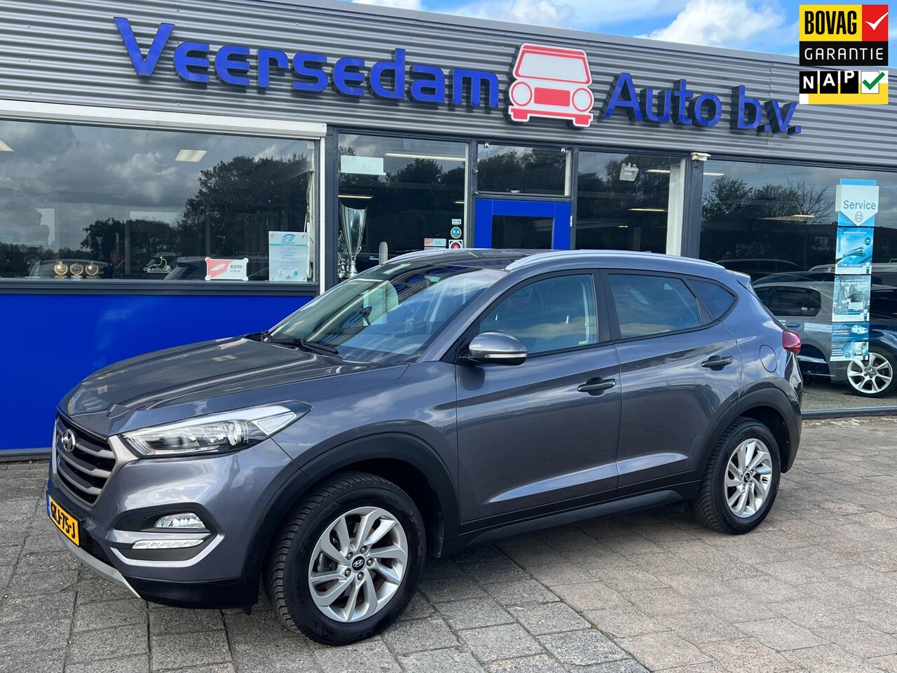 Hyundai Tucson - 1.6 GDI Comfort 1.6 GDi Comfort, Camera, trekhaak enz... - AutoWereld.nl