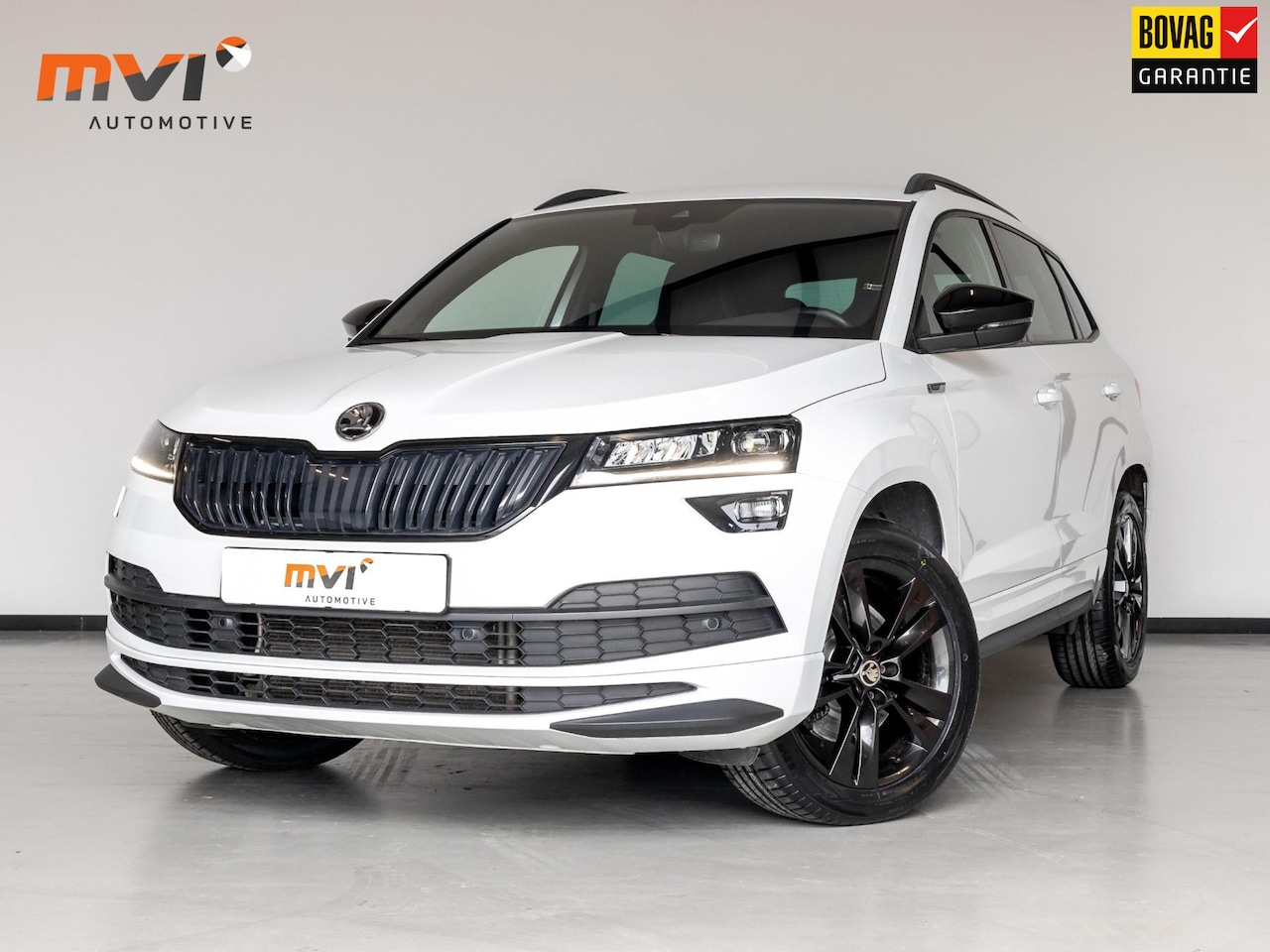 Skoda Karoq - 2.0 TSI 4x4 Sportline Business / 190pk / Trekhaak / Cruise / Navi / Led - AutoWereld.nl