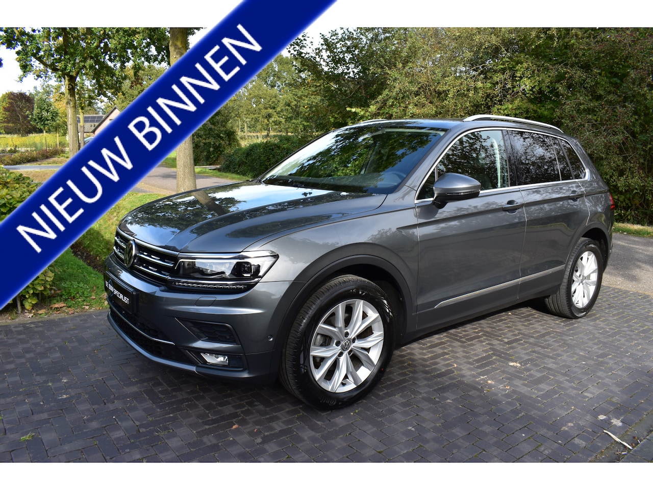 Volkswagen Tiguan - 1.4 TSI 4Motion Highline Full Trekhaak 67DKM! - AutoWereld.nl