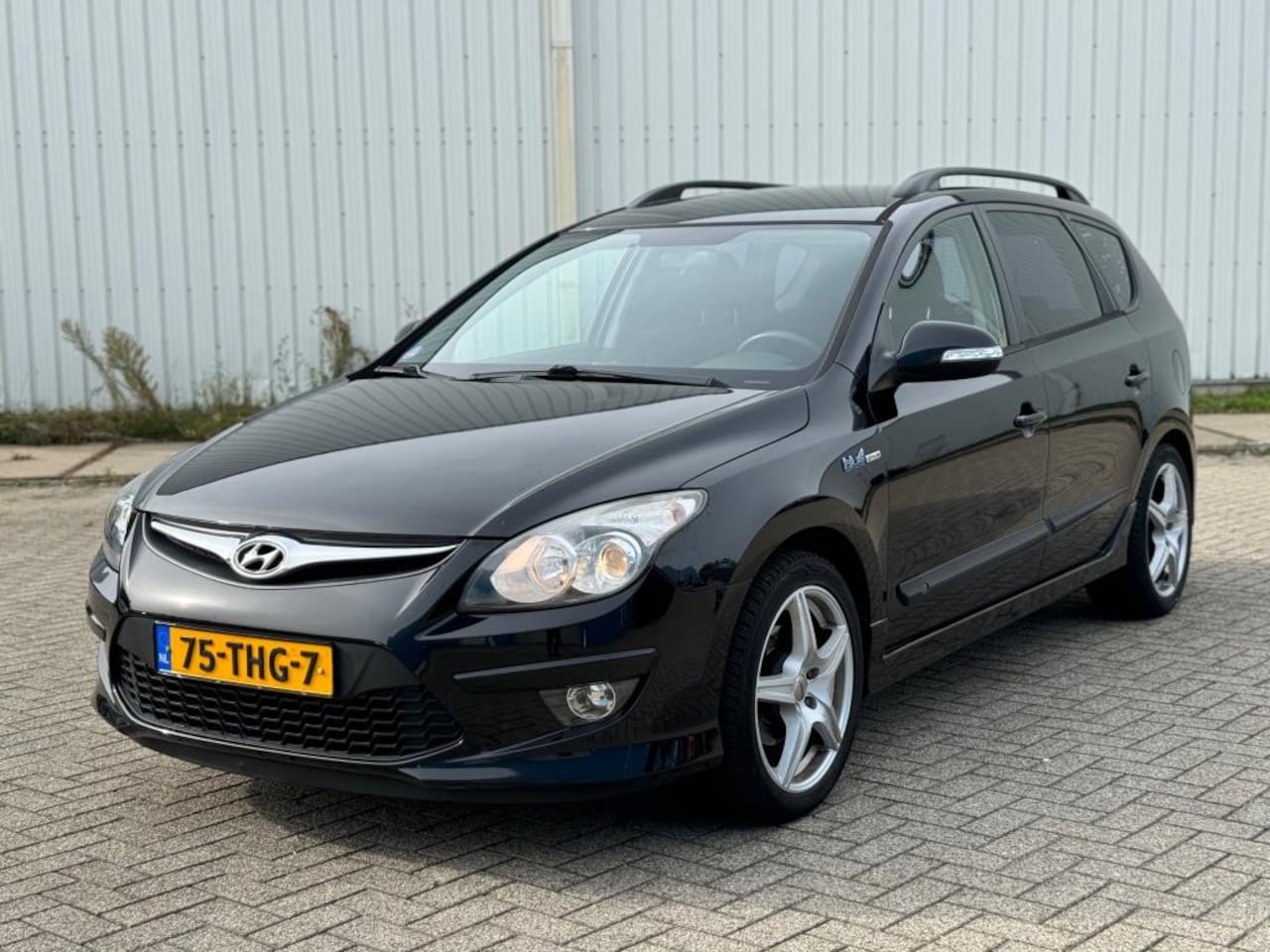 Hyundai i30 CW - 1.4i i-Motion Clima Airco Zwart Elektrisch Ramen - AutoWereld.nl