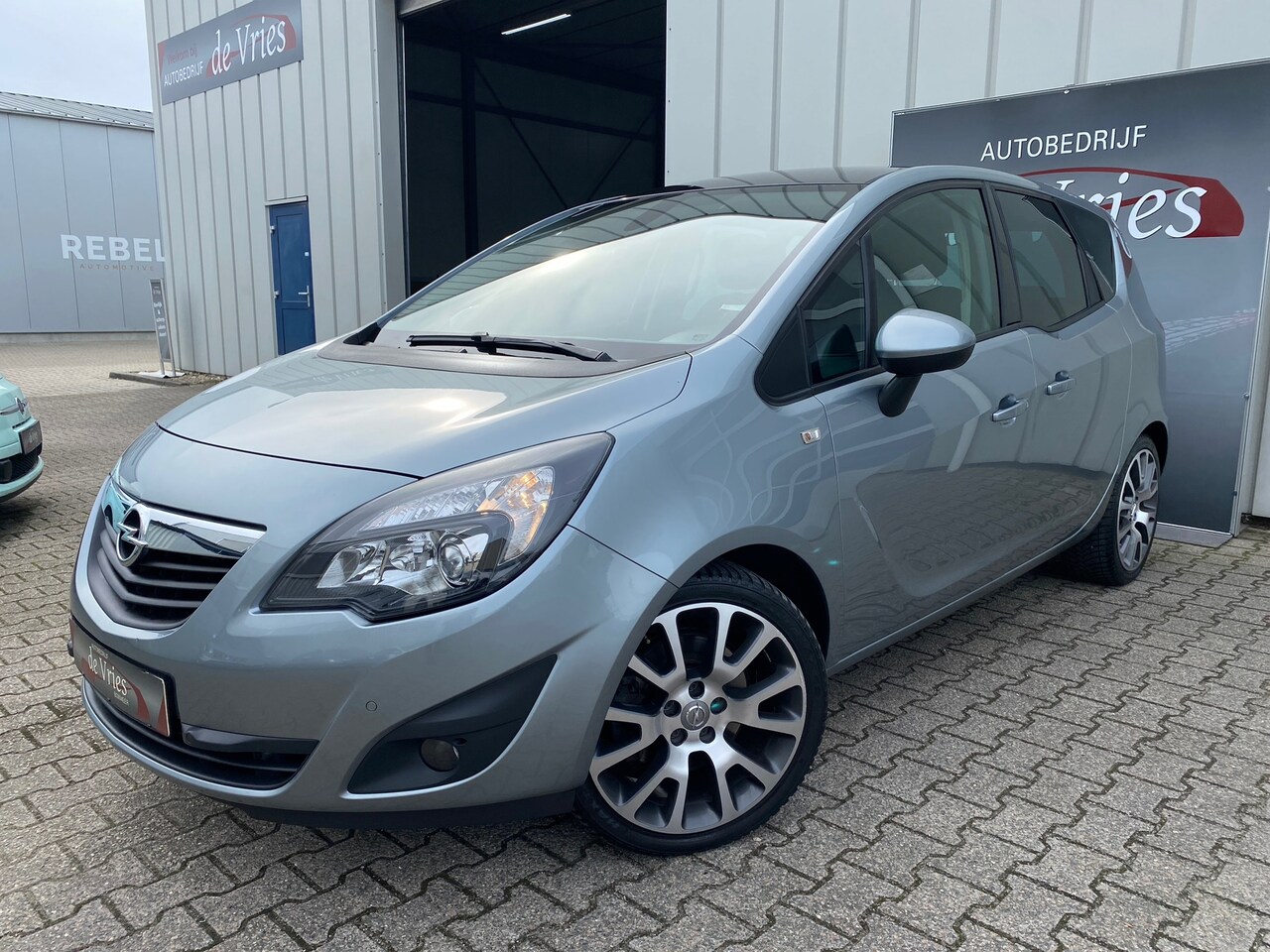 Opel Meriva - 1.4 Turbo Cosmo / Stuur-Stoelverw. / Airco / Cruise / PDC V+A / 18 Inch lmv - AutoWereld.nl